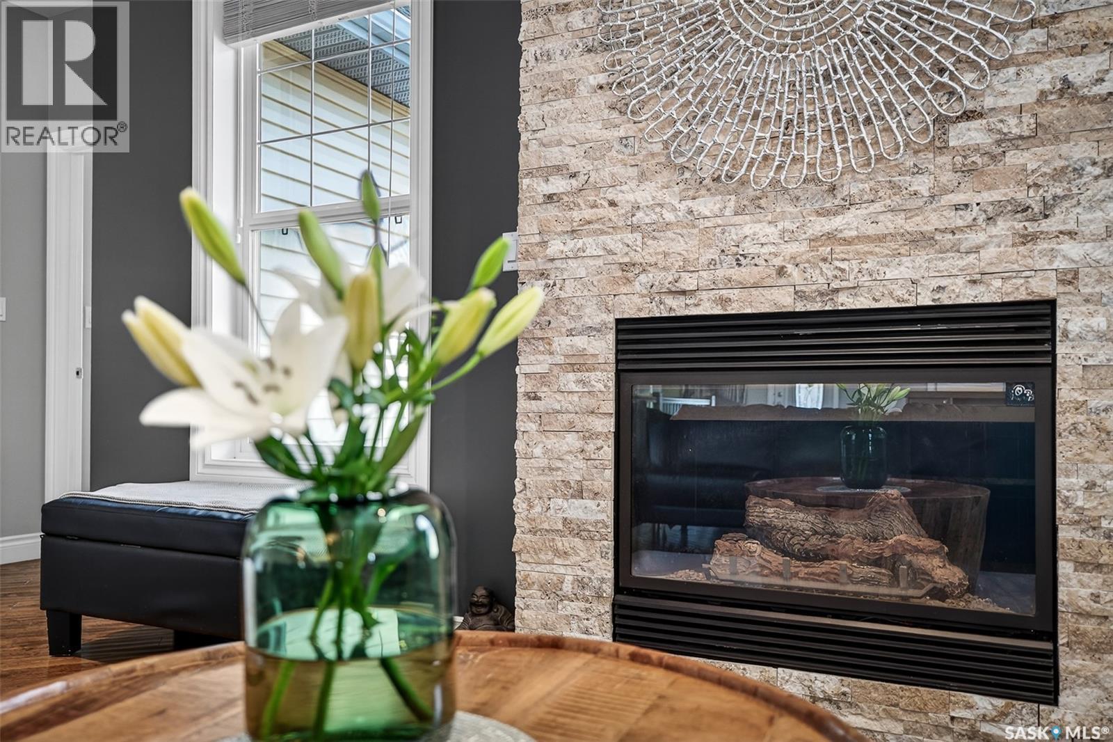 66 Everton Crescent, Moose Jaw, SK - Indoor Photo Showing Living Room With Fireplace