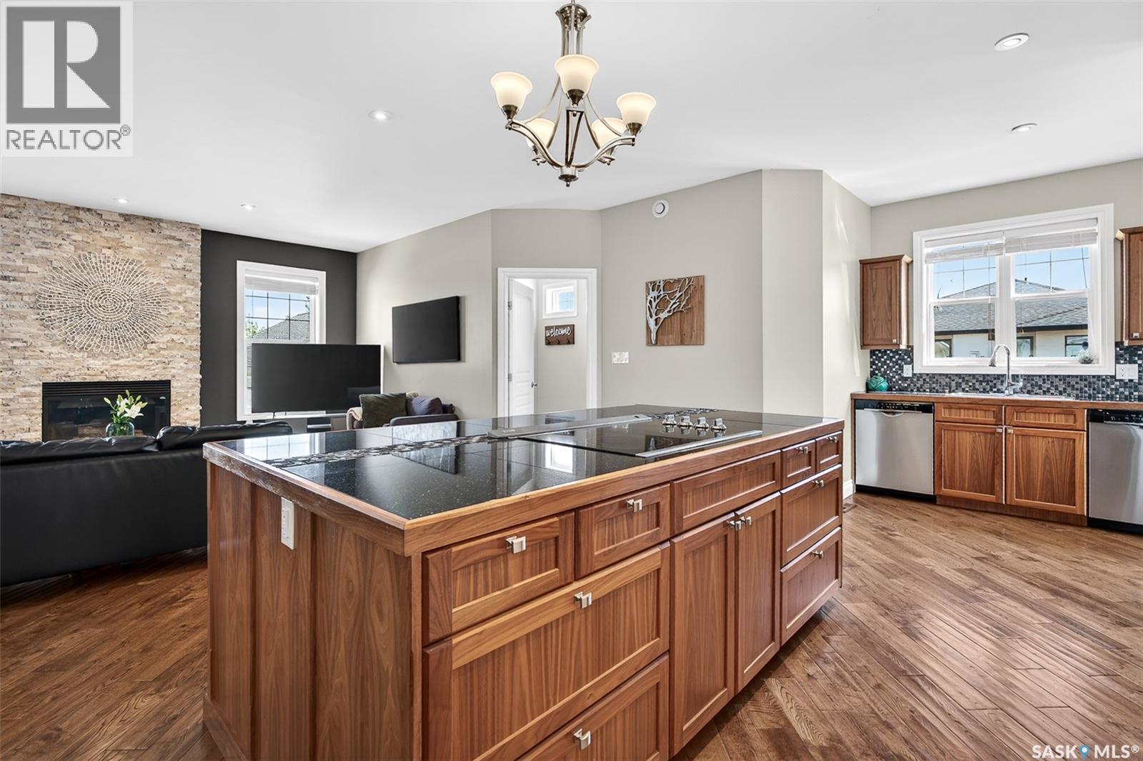 66 Everton Crescent, Moose Jaw, SK - Indoor Photo Showing Kitchen With Fireplace