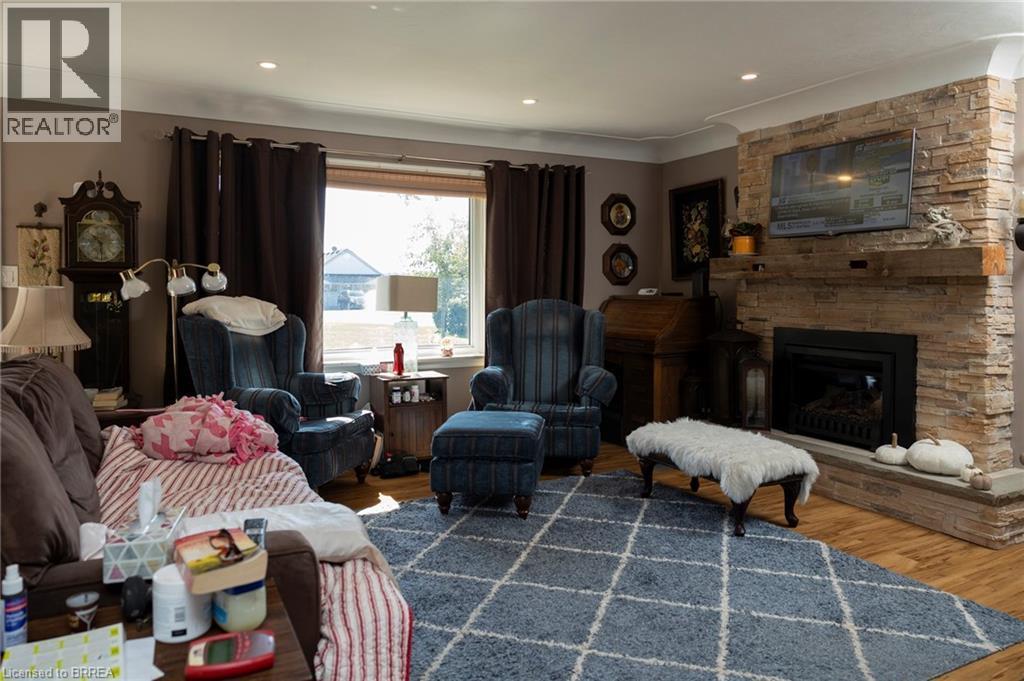 206 King Street, Burford, ON - Indoor Photo Showing Living Room With Fireplace