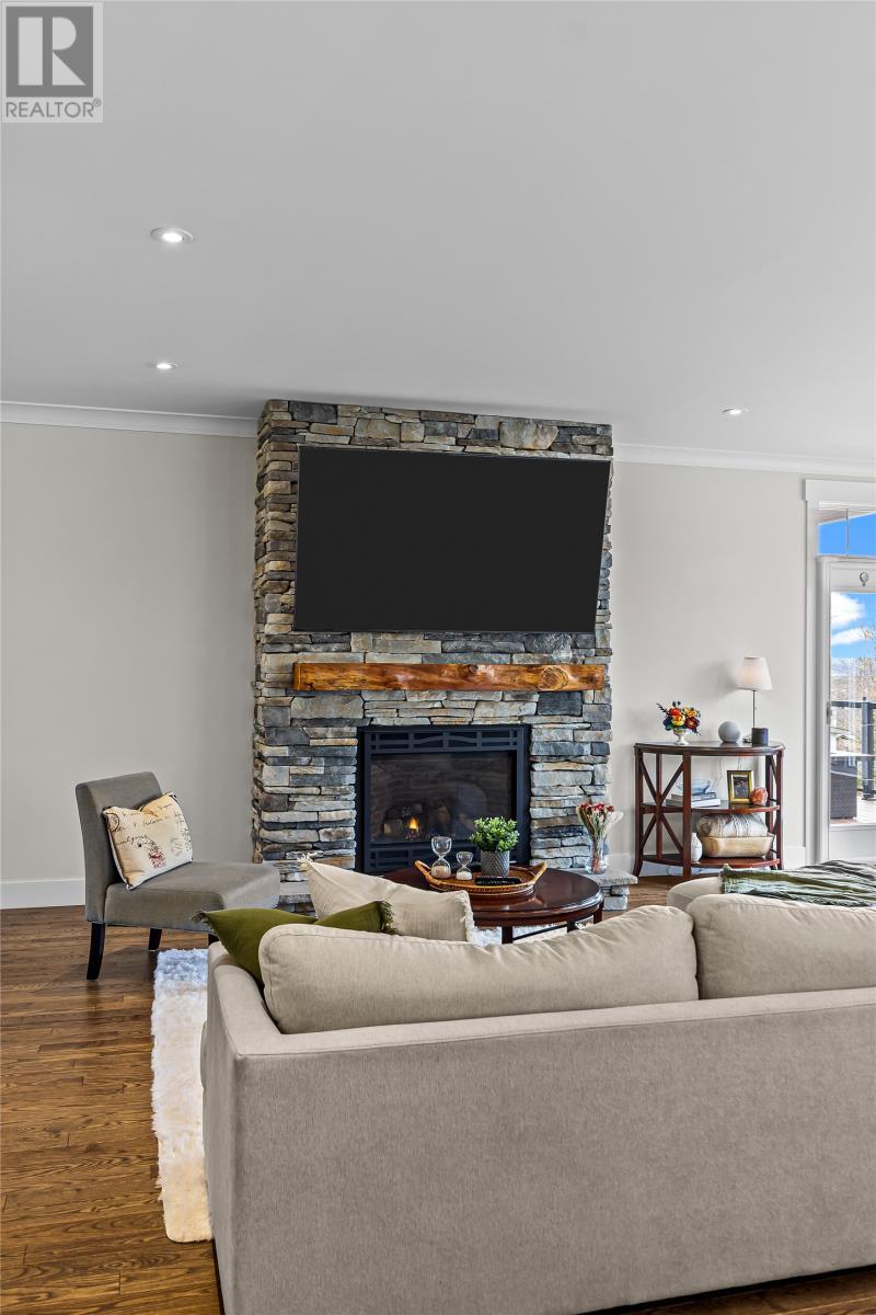 9 Mitchview Estates, Conception Bay South, NL - Indoor Photo Showing Living Room With Fireplace