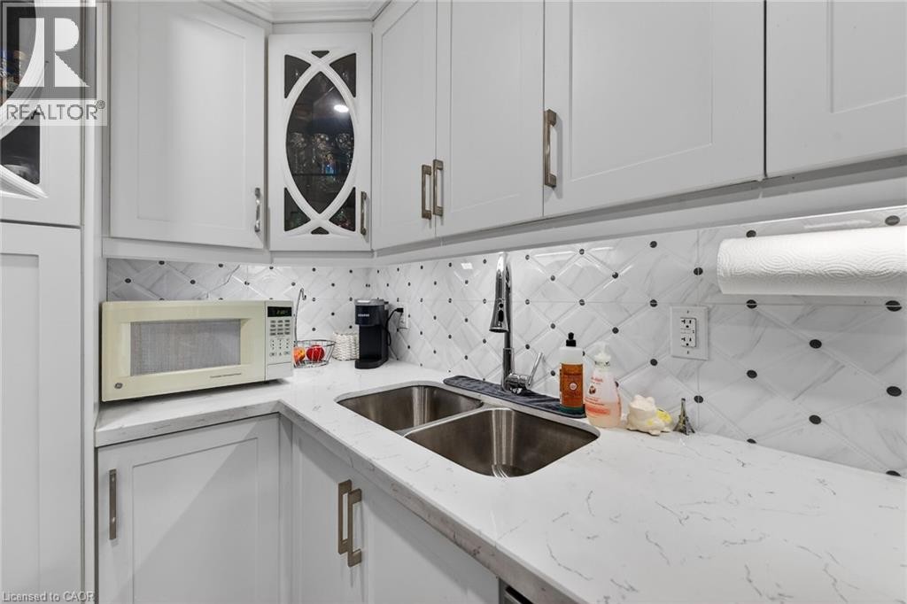 219 Hess Street S, Hamilton, ON - Indoor Photo Showing Kitchen With Double Sink