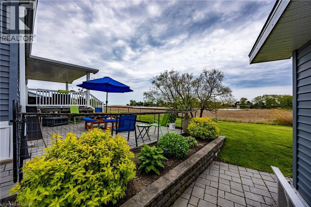 Between house and detached garage, - 2 Hickory Hollow, Nanticoke, ON - Outdoor