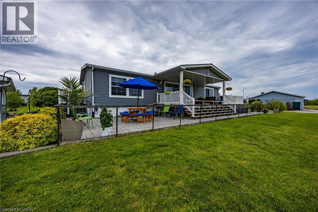 View from the creekside - 2 Hickory Hollow, Nanticoke, ON - Outdoor With Deck Patio Veranda