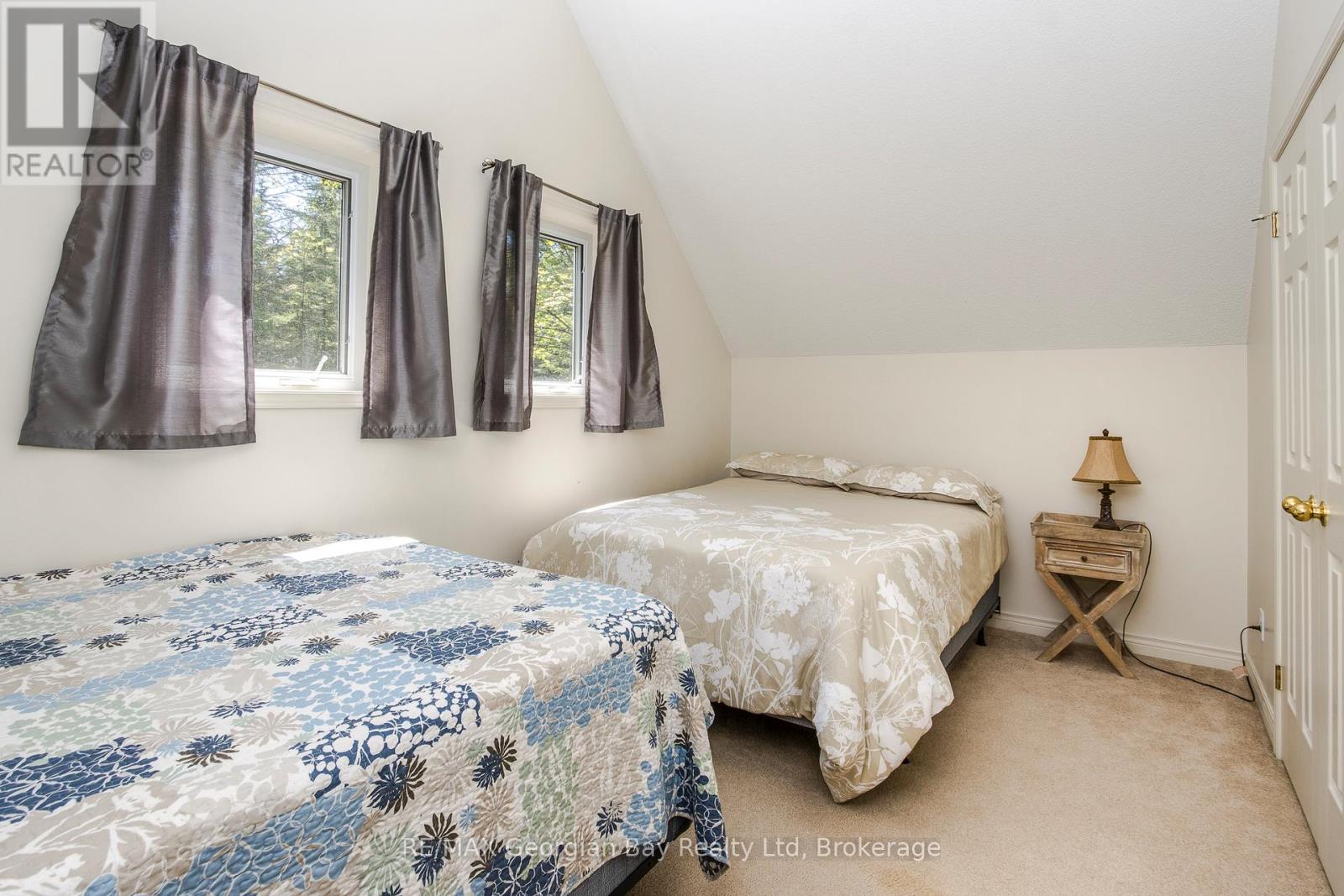 3rd Bedroom - 2nd Level - 2 Ridout Court, Tiny, ON - Indoor Photo Showing Bedroom