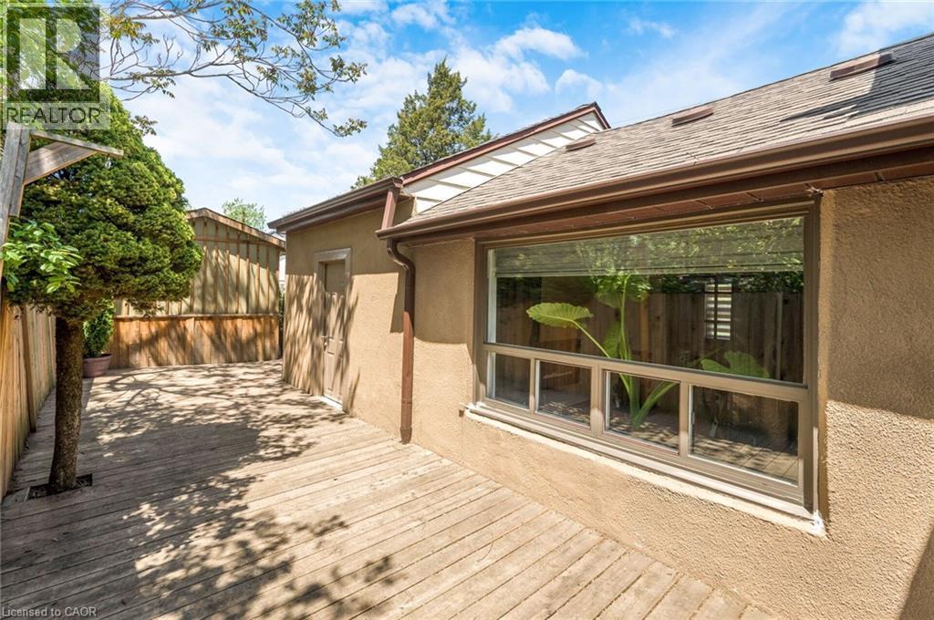Expansive outdoor decking area with privacy fencing - 1 Galbraith Drive, Hamilton, ON - Outdoor With Deck Patio Veranda With Exterior