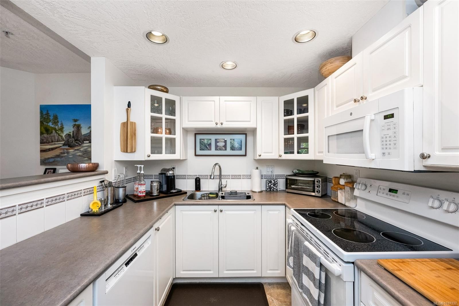 #109-380 Waterfront Cres, Victoria, BC - Indoor Photo Showing Kitchen With Double Sink
