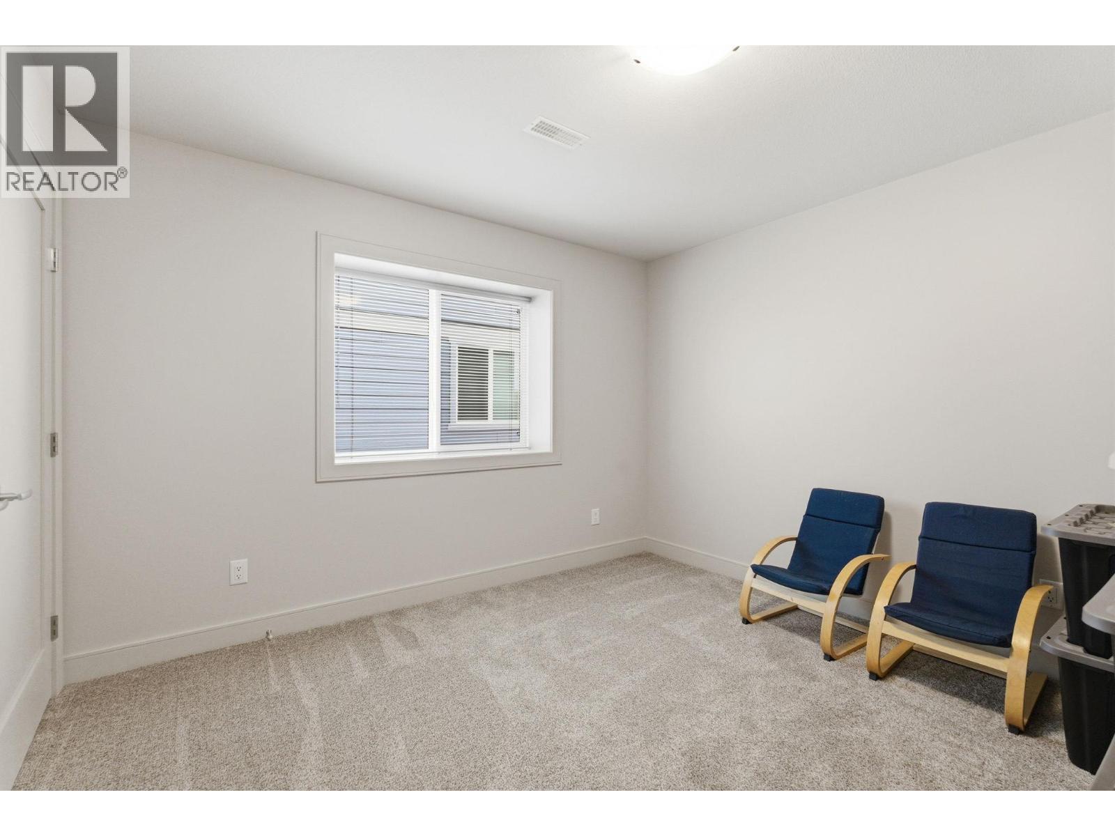 Suite 2nd bedroom - 536 Tungsten Court, Kelowna, BC - Indoor Photo Showing Other Room