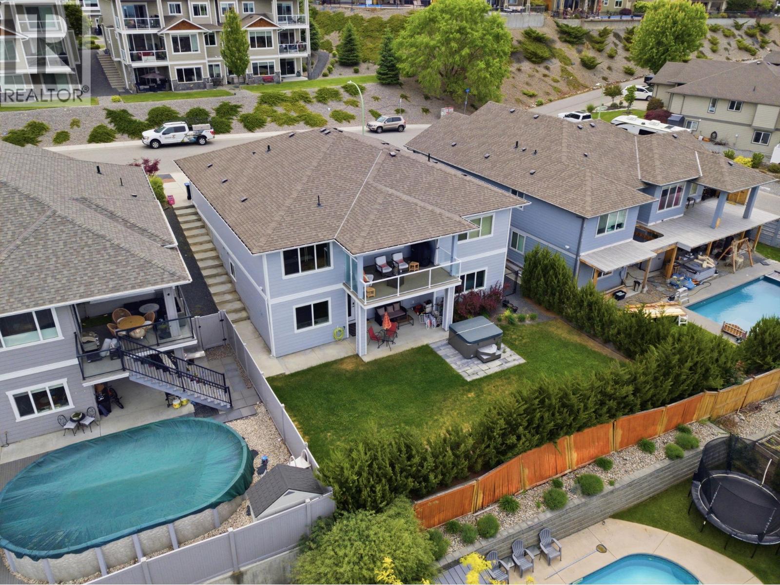 536 Tungsten Court, Kelowna, BC - Outdoor With In Ground Pool With Deck Patio Veranda