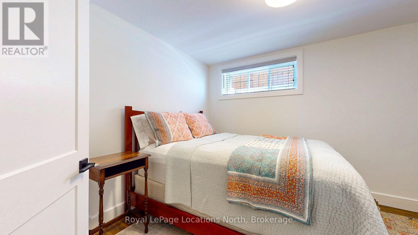 Basement Bedroom 2 - 70 Plewes Drive, Collingwood, ON - Indoor Photo Showing Bedroom