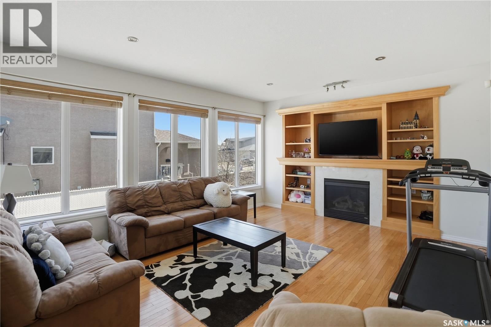 3714 Sandringham Road E, Regina, SK - Indoor Photo Showing Living Room With Fireplace