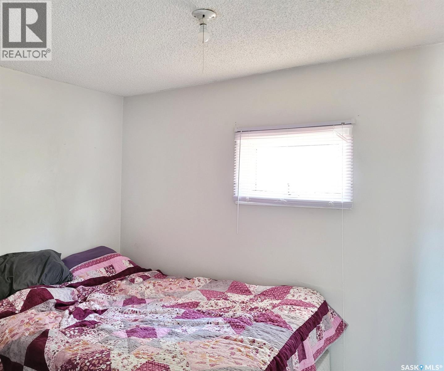601 3Rd Avenue E, Meadow Lake, SK - Indoor Photo Showing Bedroom