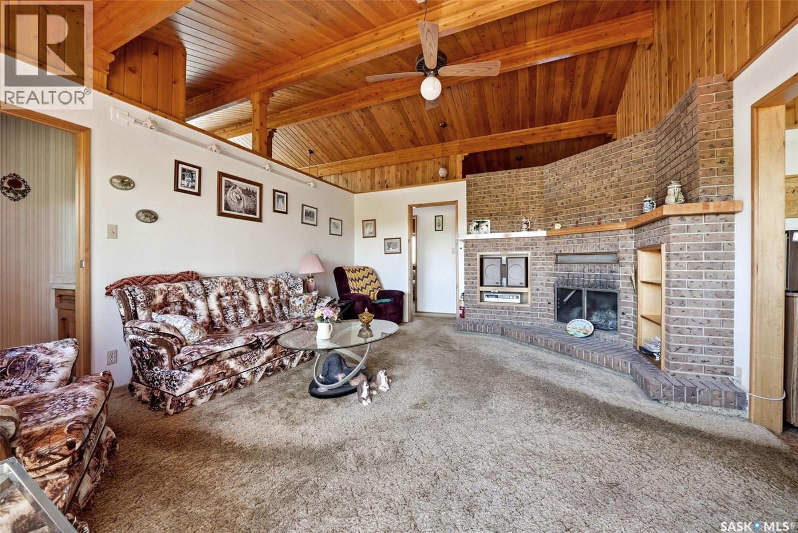 45 Miller Crescent E, Lumsden, SK - Indoor With Fireplace