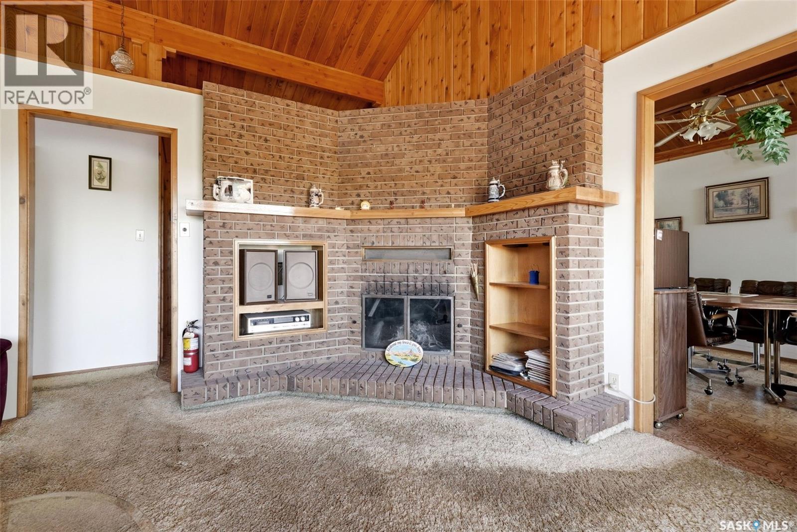 45 Miller Crescent E, Lumsden, SK - Indoor With Fireplace