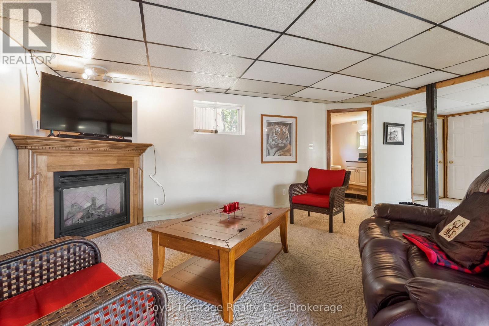 16 Fire Route 122, Trent Lakes, ON - Indoor Photo Showing Living Room With Fireplace