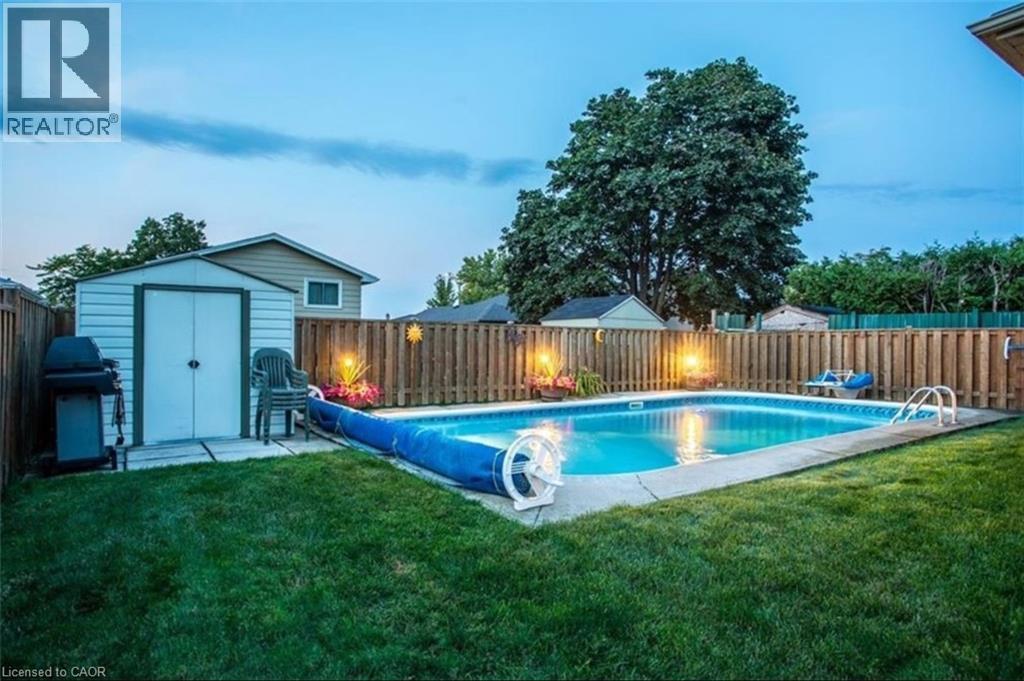 87 Locheed Drive Unit# Upper, Hamilton, ON - Outdoor With In Ground Pool With Backyard