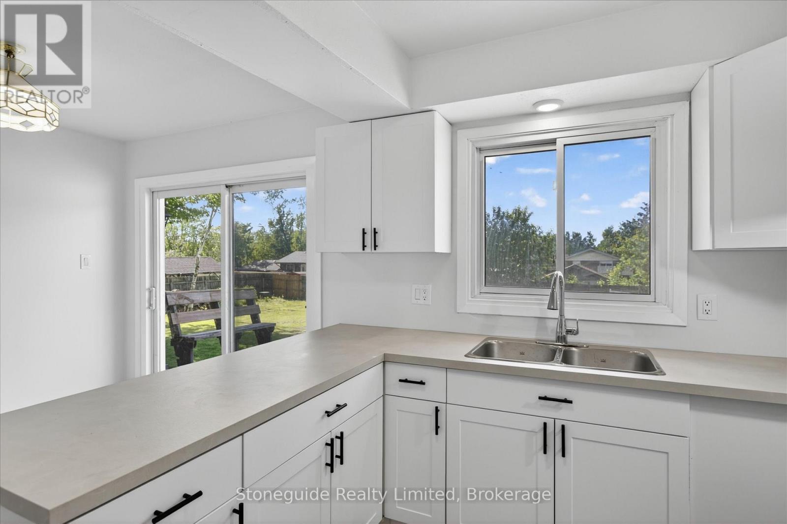 667 Skyline Road, Selwyn, ON - Indoor Photo Showing Kitchen With Double Sink