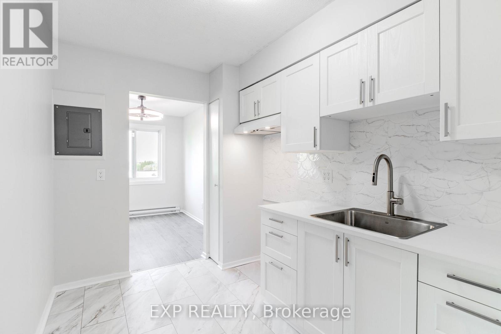 Quartz Counters - New Sink & Fixtures - 404 B - 2044 Arrowsmith Drive, Ottawa, ON - Indoor Photo Showing Kitchen