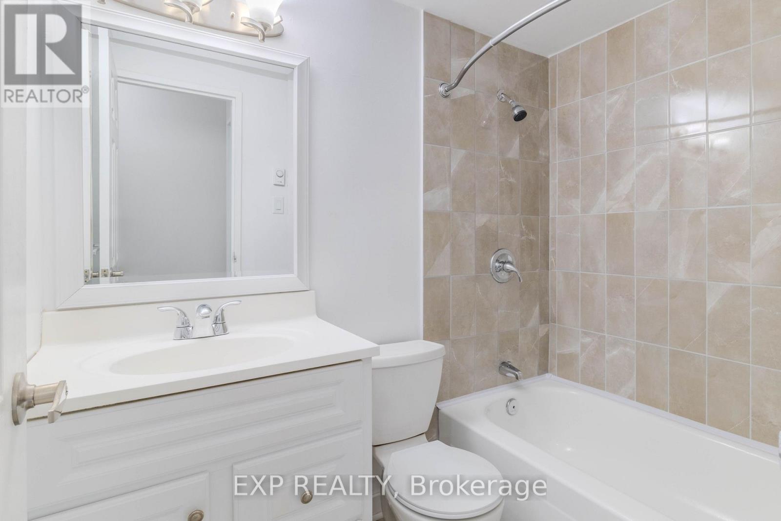 New Vanity - Toilet - Flooring & Tile Work! - 404 B - 2044 Arrowsmith Drive, Ottawa, ON - Indoor Photo Showing Bathroom