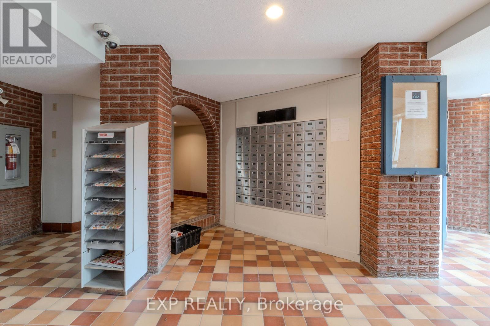Mail Boxes Conveniently in the Main Lobby - 404 B - 2044 Arrowsmith Drive, Ottawa, ON - Photo Showing Other Room