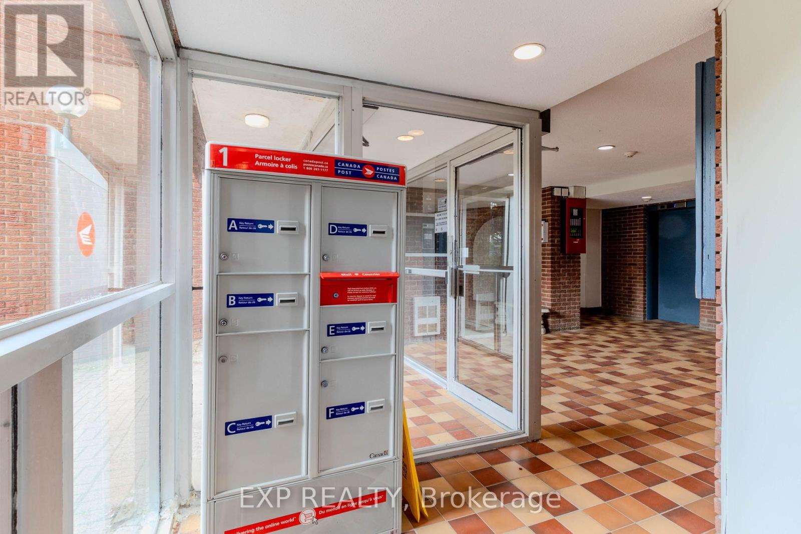 Canada Post Lockers for Parcel Deliveries - 404 B - 2044 Arrowsmith Drive, Ottawa, ON - Indoor Photo Showing Other Room