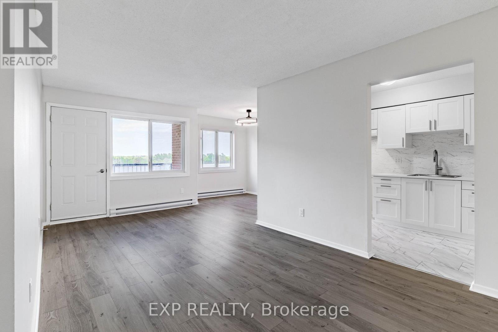 Bright & Open - All New Flooring - 404 B - 2044 Arrowsmith Drive, Ottawa, ON - Indoor Photo Showing Other Room