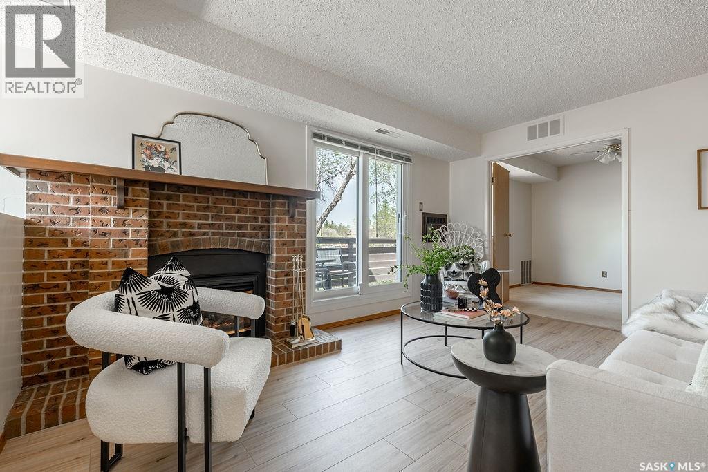 507 603 Lenore Drive, Saskatoon, SK - Indoor Photo Showing Living Room With Fireplace