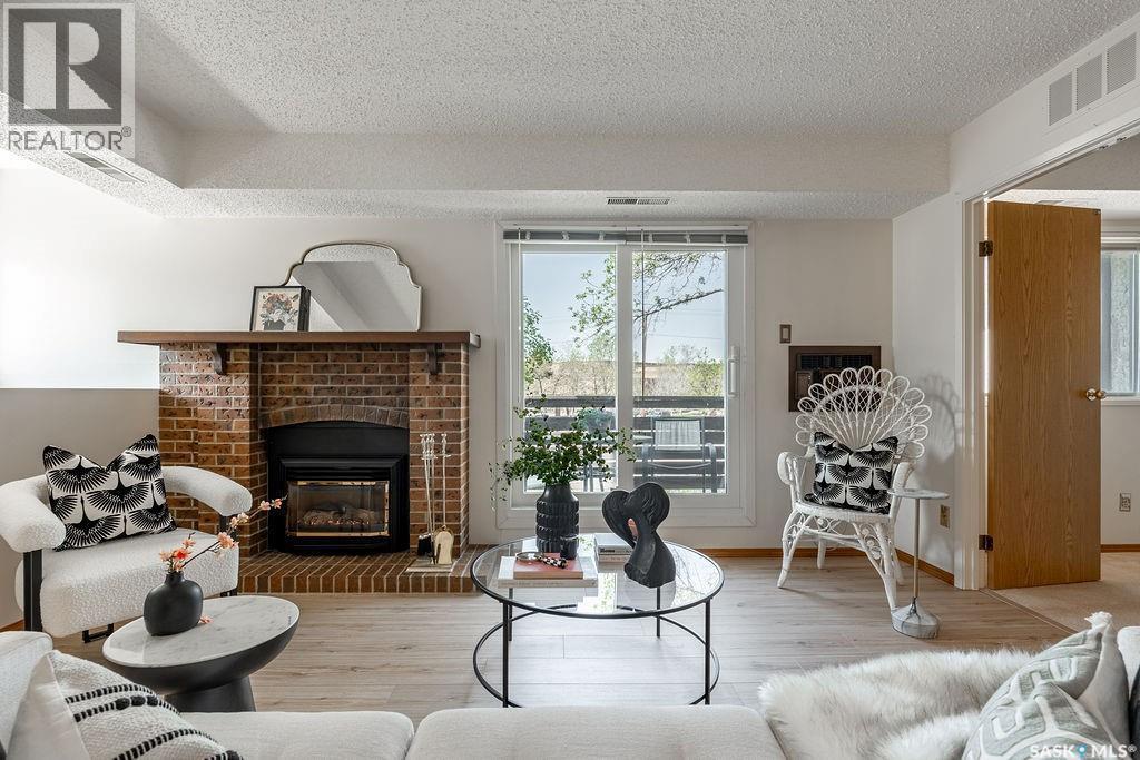 507 603 Lenore Drive, Saskatoon, SK - Indoor Photo Showing Living Room With Fireplace