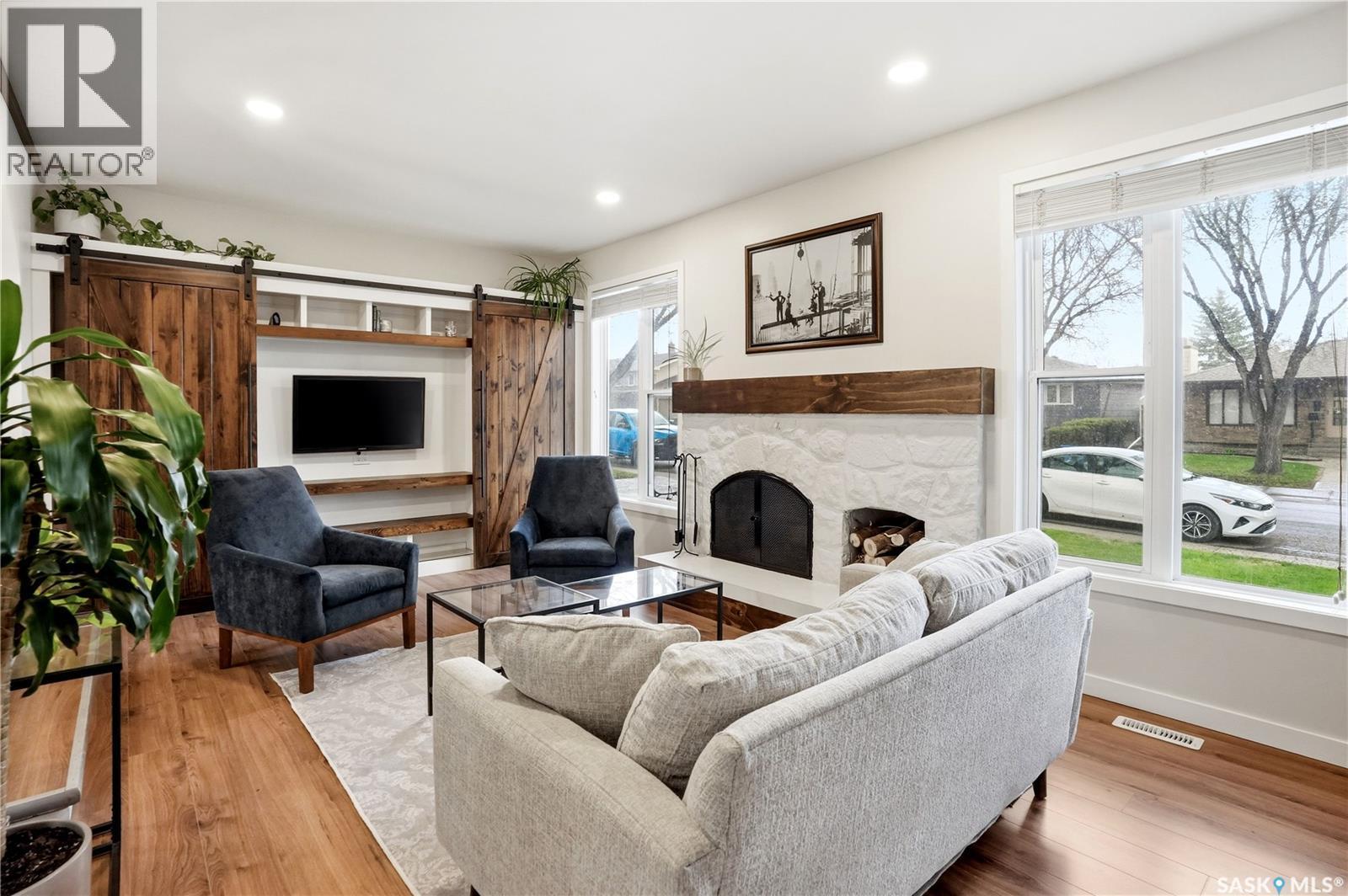14 Edenwold Crescent, Regina, SK - Indoor Photo Showing Living Room With Fireplace