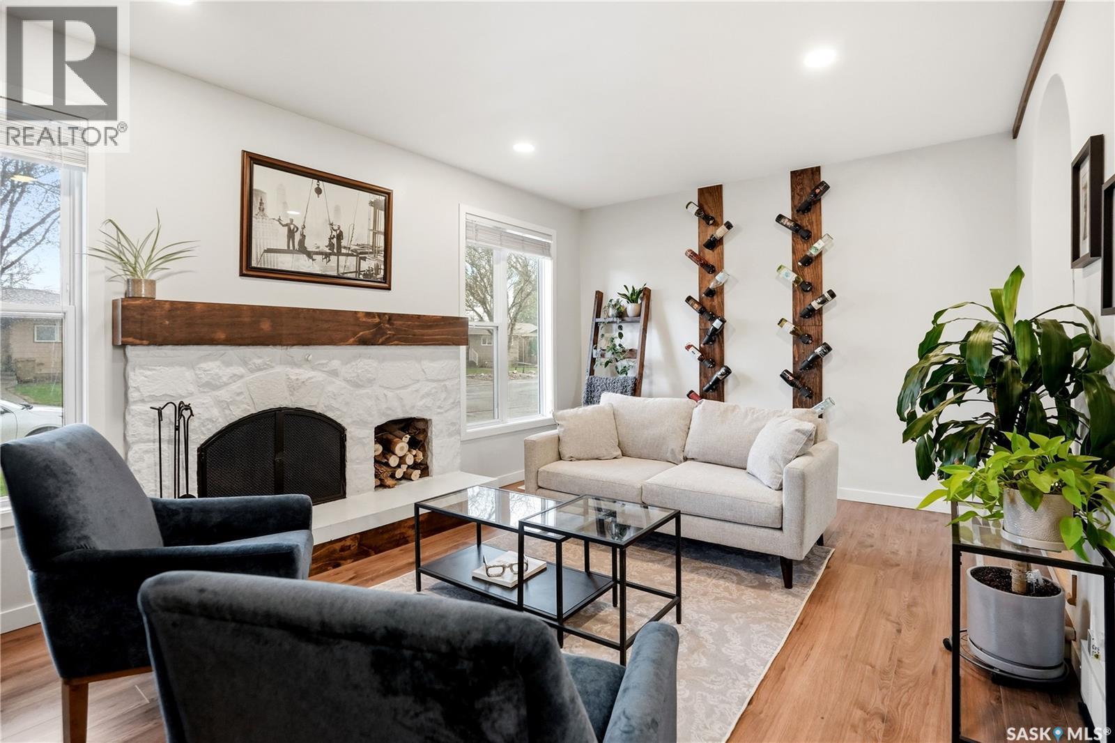 14 Edenwold Crescent, Regina, SK - Indoor Photo Showing Living Room With Fireplace