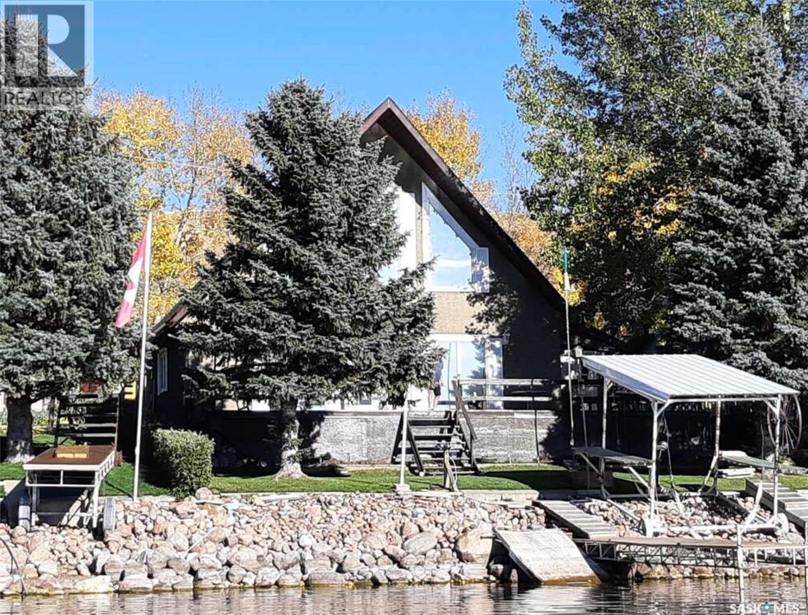 115 Heritage Drive, Lac Pelletier, SK - Outdoor With Body Of Water