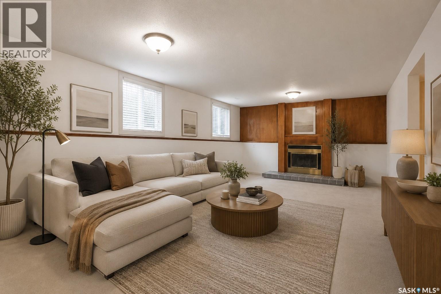 314 Waterbury Road, Saskatoon, SK - Indoor Photo Showing Living Room With Fireplace