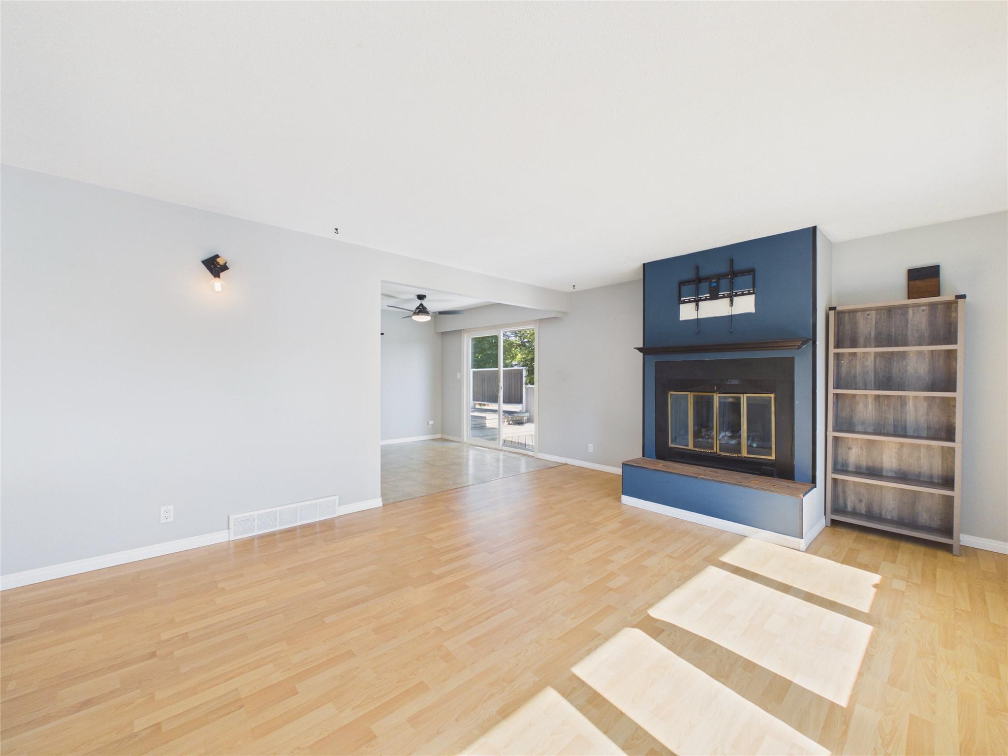 301 4Th Avenue, Cranbrook, BC - Indoor Photo Showing Living Room With Fireplace
