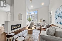 Bright Living room with 17 foot ceilings -