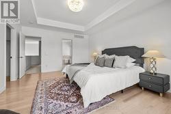 Primary bedroom with Hardwood floors -