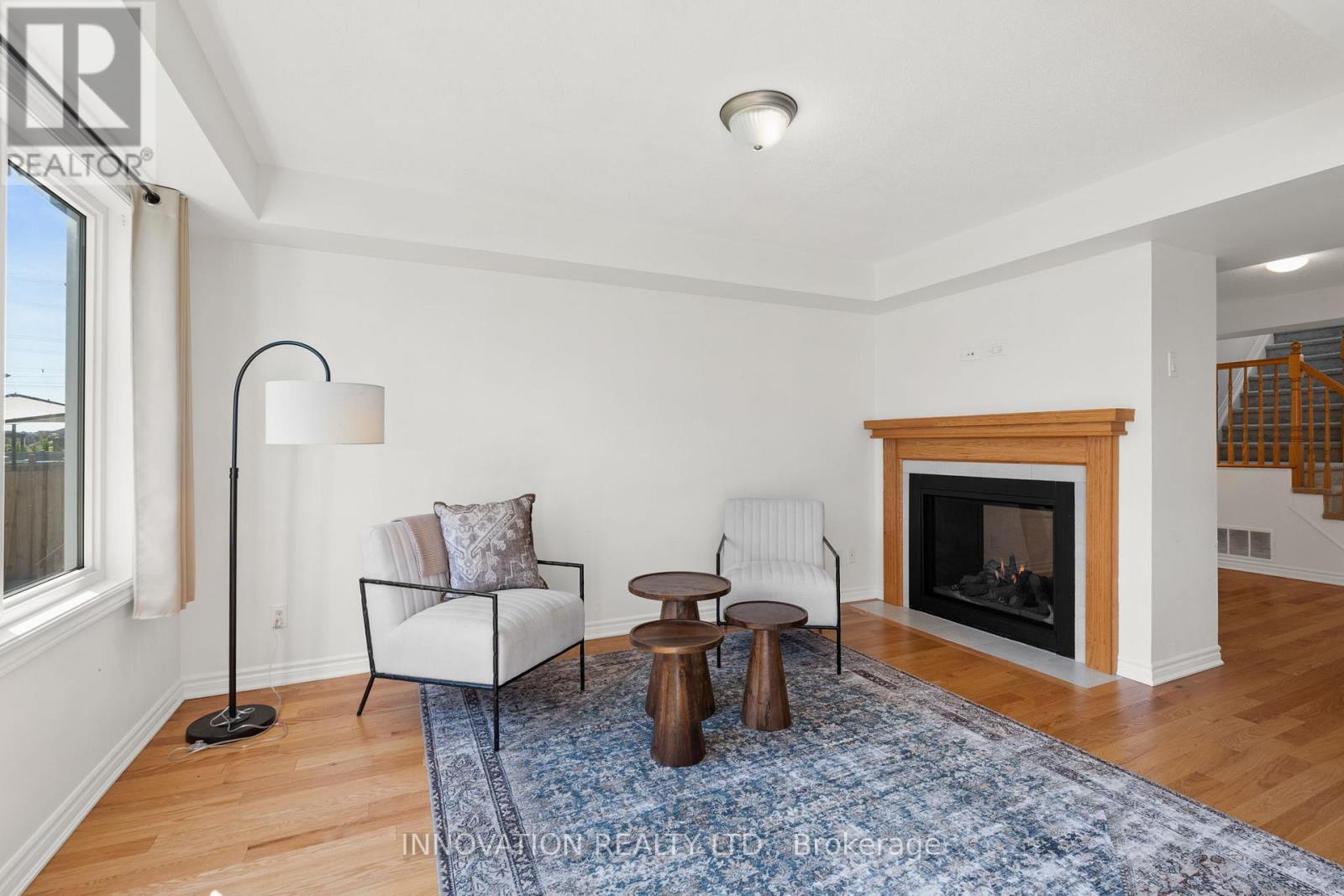 389 Rouncey Road, Ottawa, ON - Indoor Photo Showing Living Room With Fireplace