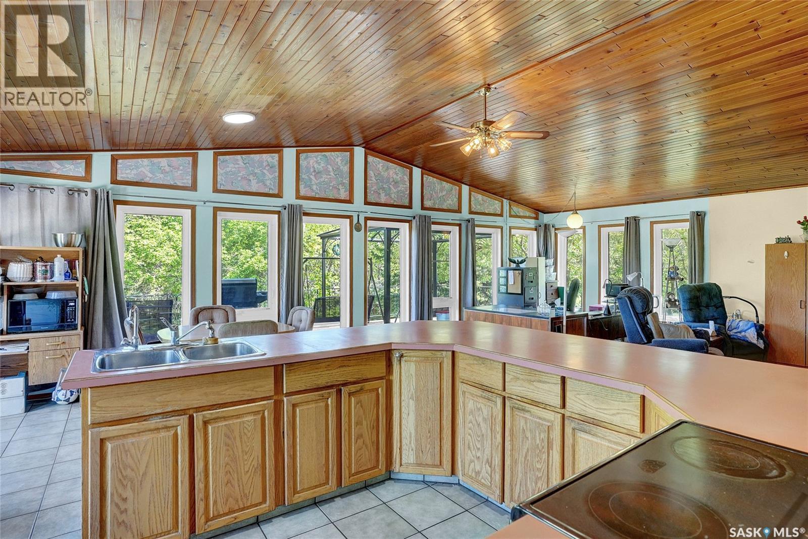 701 Tatanka Drive, Buffalo Pound Lake, SK - Indoor Photo Showing Kitchen With Double Sink