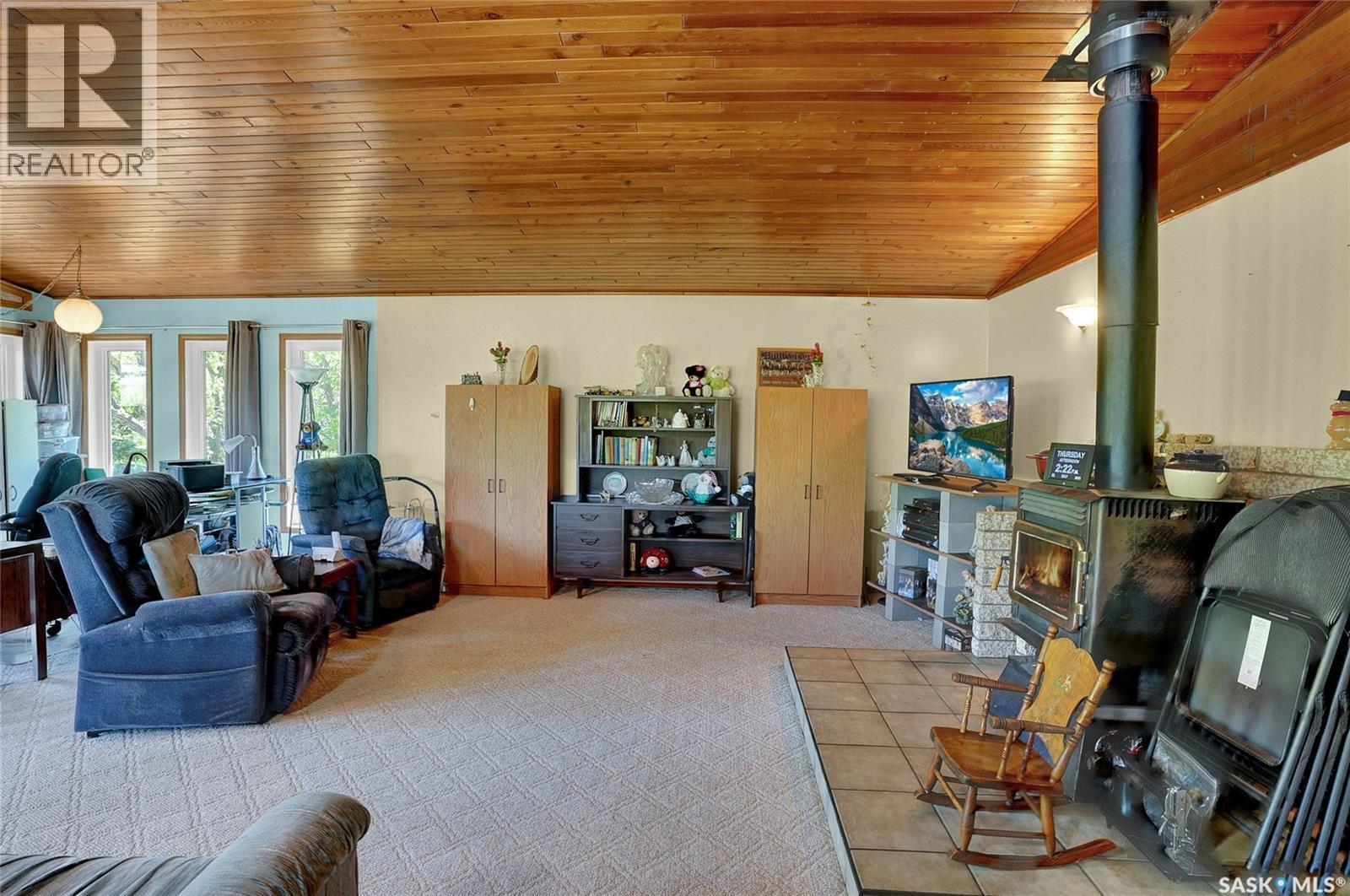 701 Tatanka Drive, Buffalo Pound Lake, SK - Indoor With Fireplace