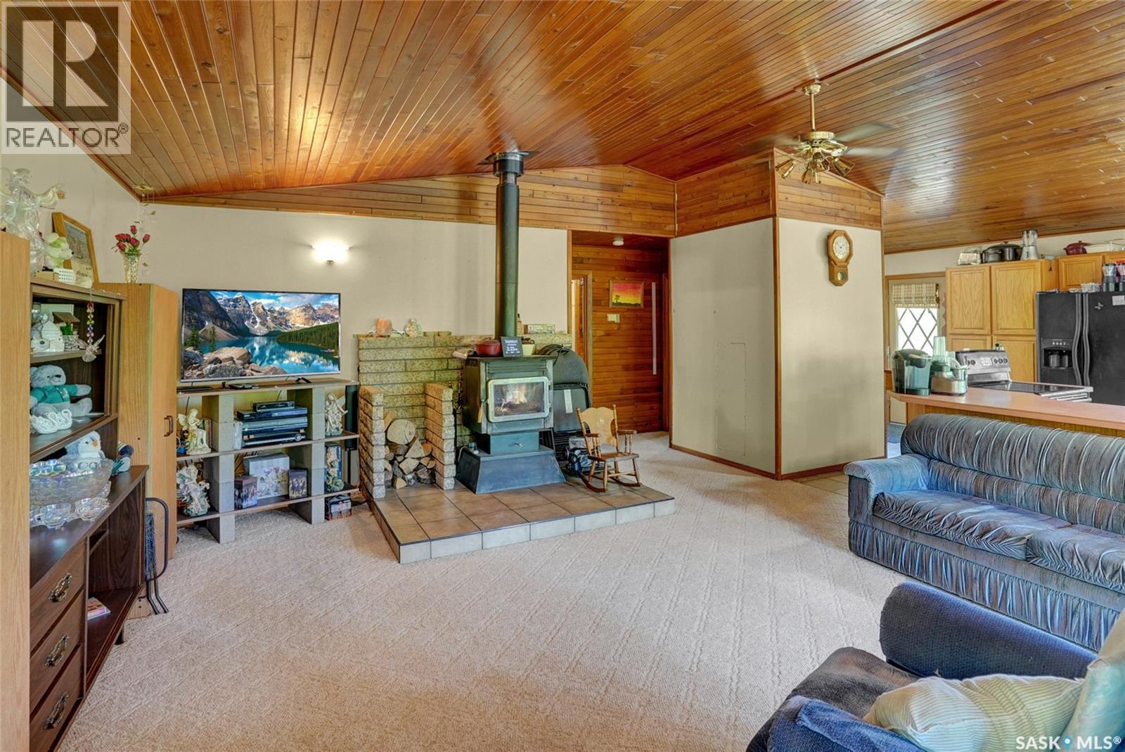 701 Tatanka Drive, Buffalo Pound Lake, SK - Indoor With Fireplace