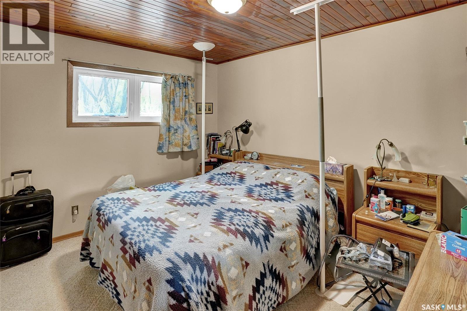 701 Tatanka Drive, Buffalo Pound Lake, SK - Indoor Photo Showing Bedroom