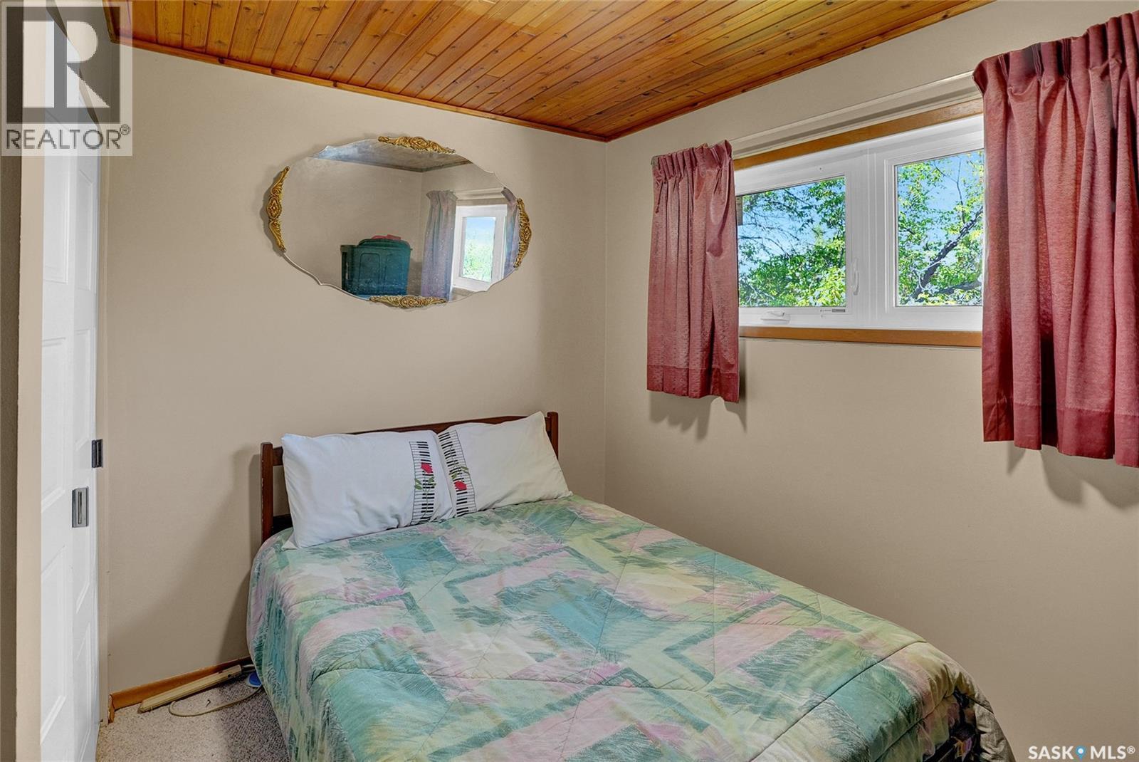 701 Tatanka Drive, Buffalo Pound Lake, SK - Indoor Photo Showing Bedroom