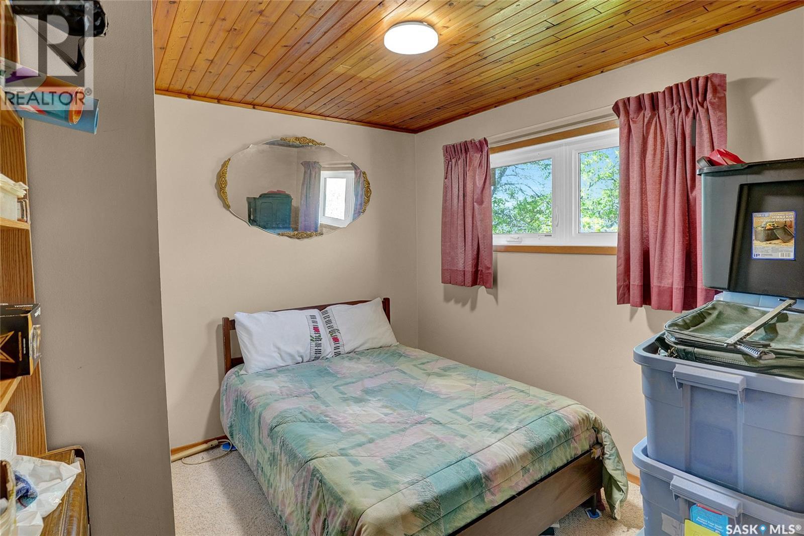 701 Tatanka Drive, Buffalo Pound Lake, SK - Indoor Photo Showing Bedroom