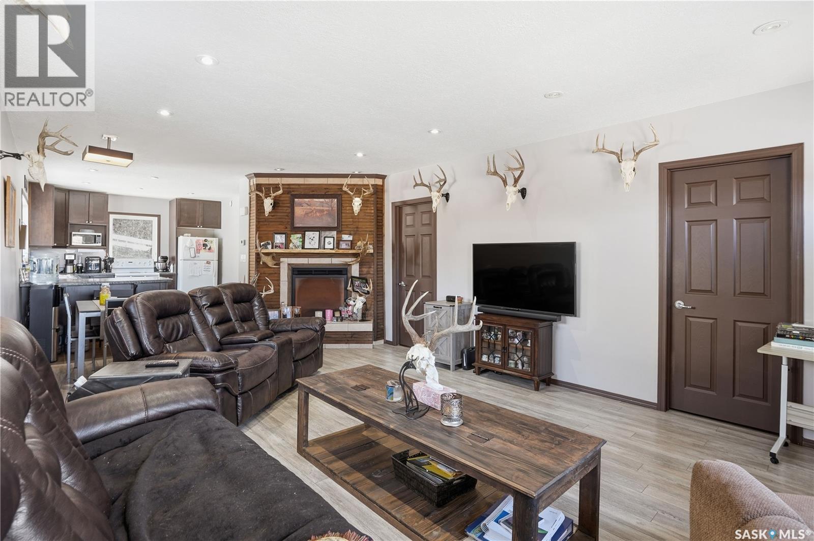24 Alice Crescent, Marquis Rm No. 191, SK - Indoor Photo Showing Living Room With Fireplace