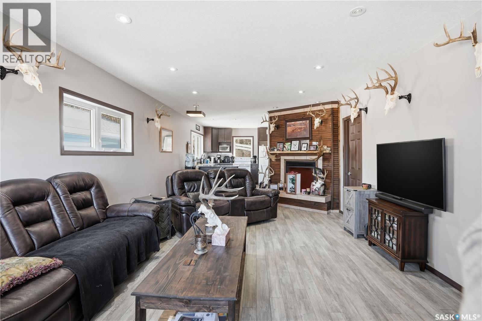 24 Alice Crescent, Marquis Rm No. 191, SK - Indoor Photo Showing Living Room With Fireplace