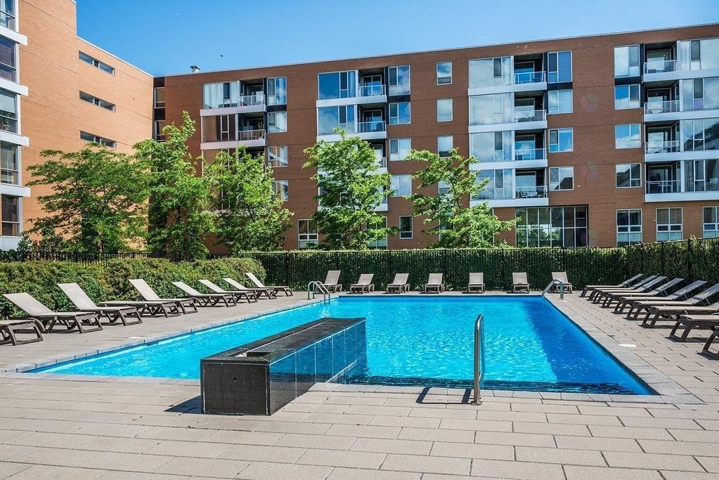 Front of Structure - Th123-210 Ch. Du Golf, Montréal (Verdun/Île-Des-Soeurs), QC - Outdoor With In Ground Pool With Balcony