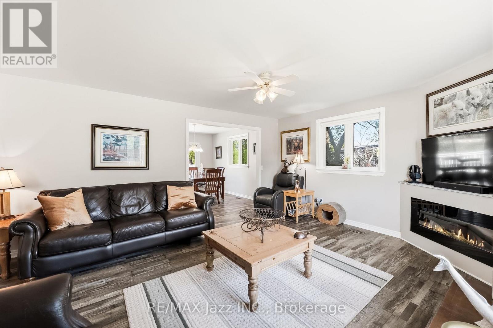 5492 Hwy 620, Wollaston, ON - Indoor Photo Showing Living Room With Fireplace