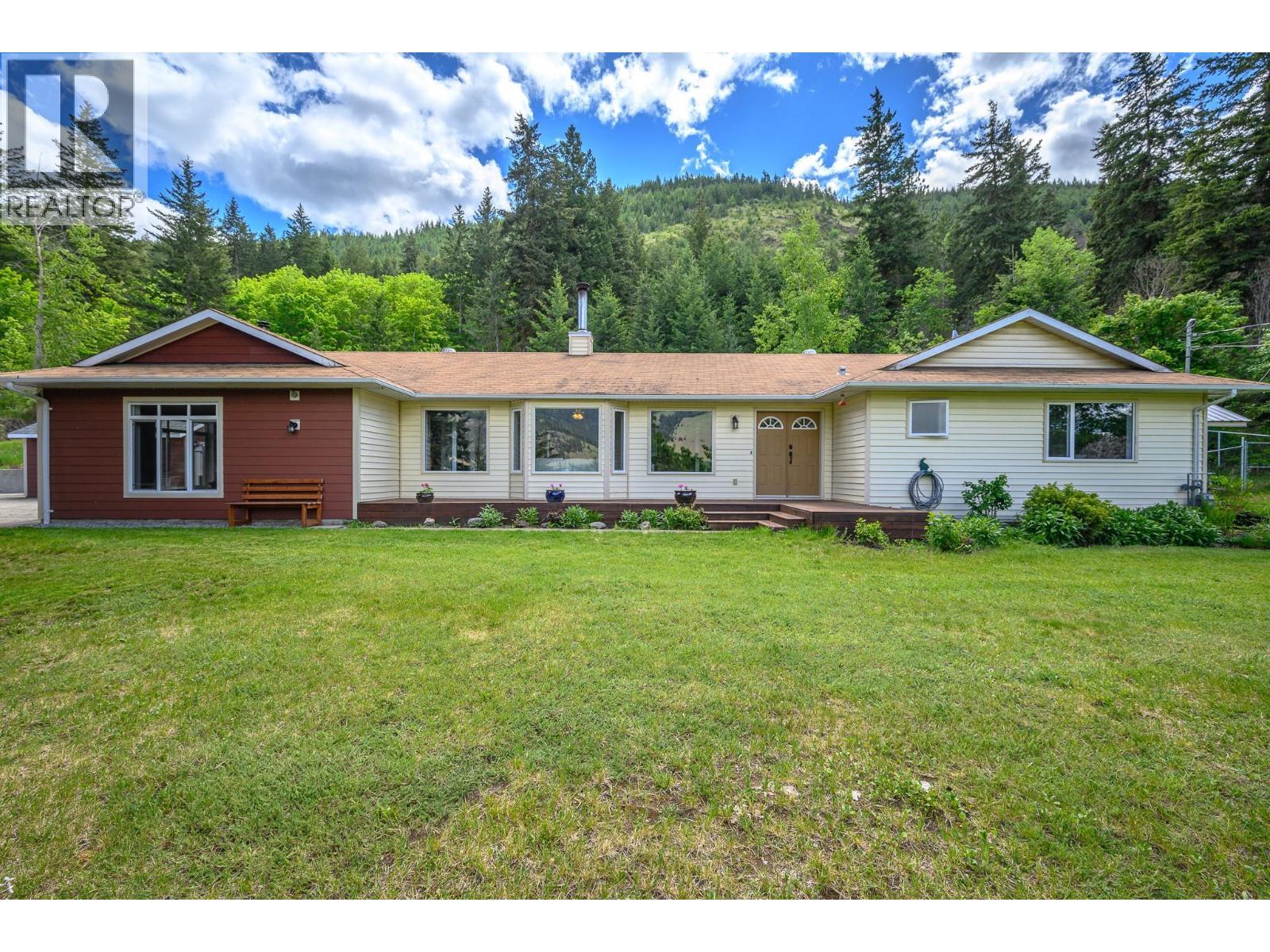 6960 Brewer Road, Coldstream, BC - Outdoor With Facade