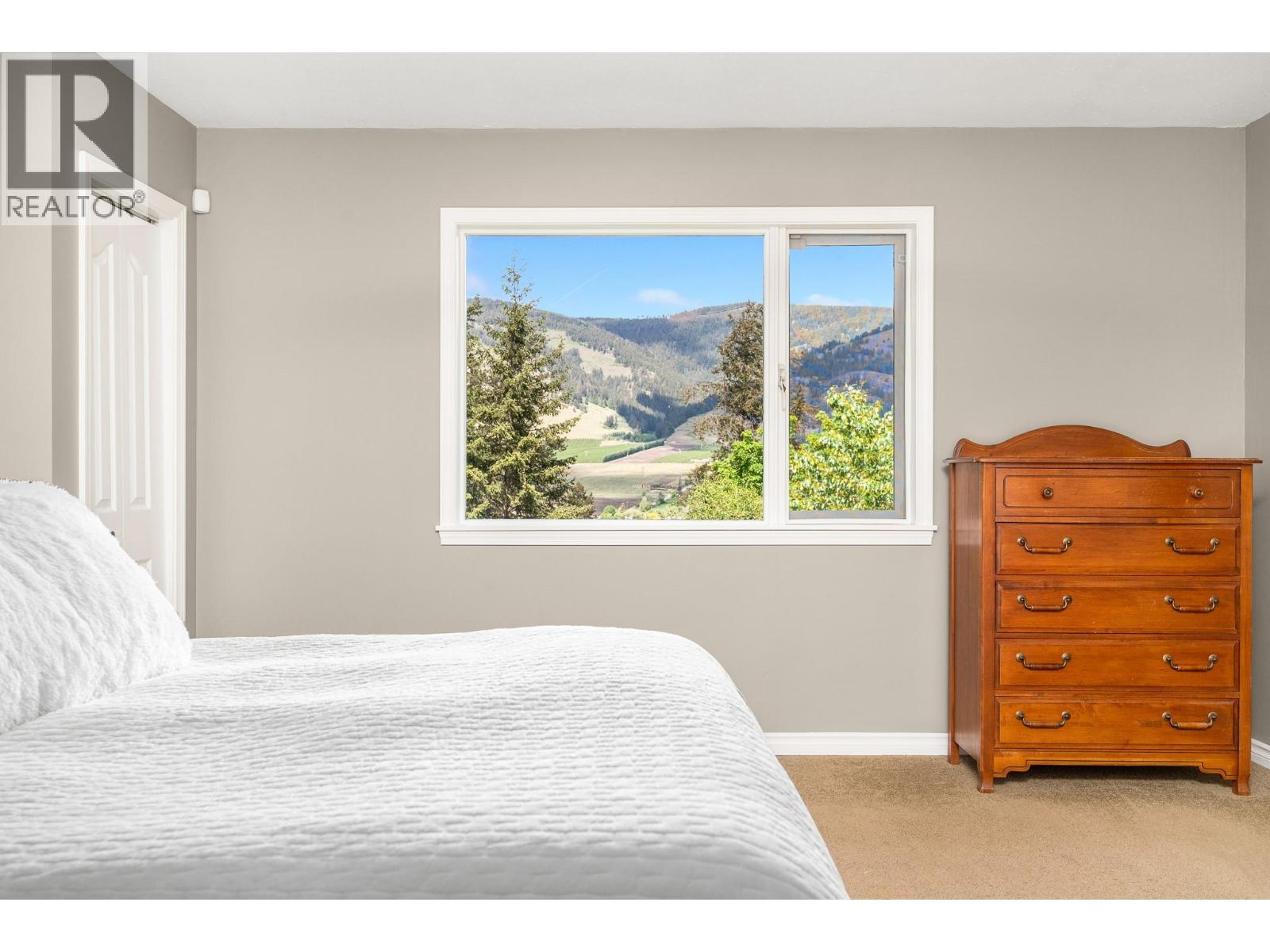 6960 Brewer Road, Coldstream, BC - Indoor Photo Showing Bedroom