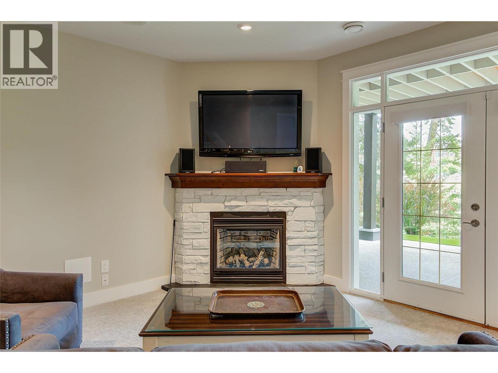 210 Dormie Place, Vernon, BC - Indoor Photo Showing Living Room With Fireplace