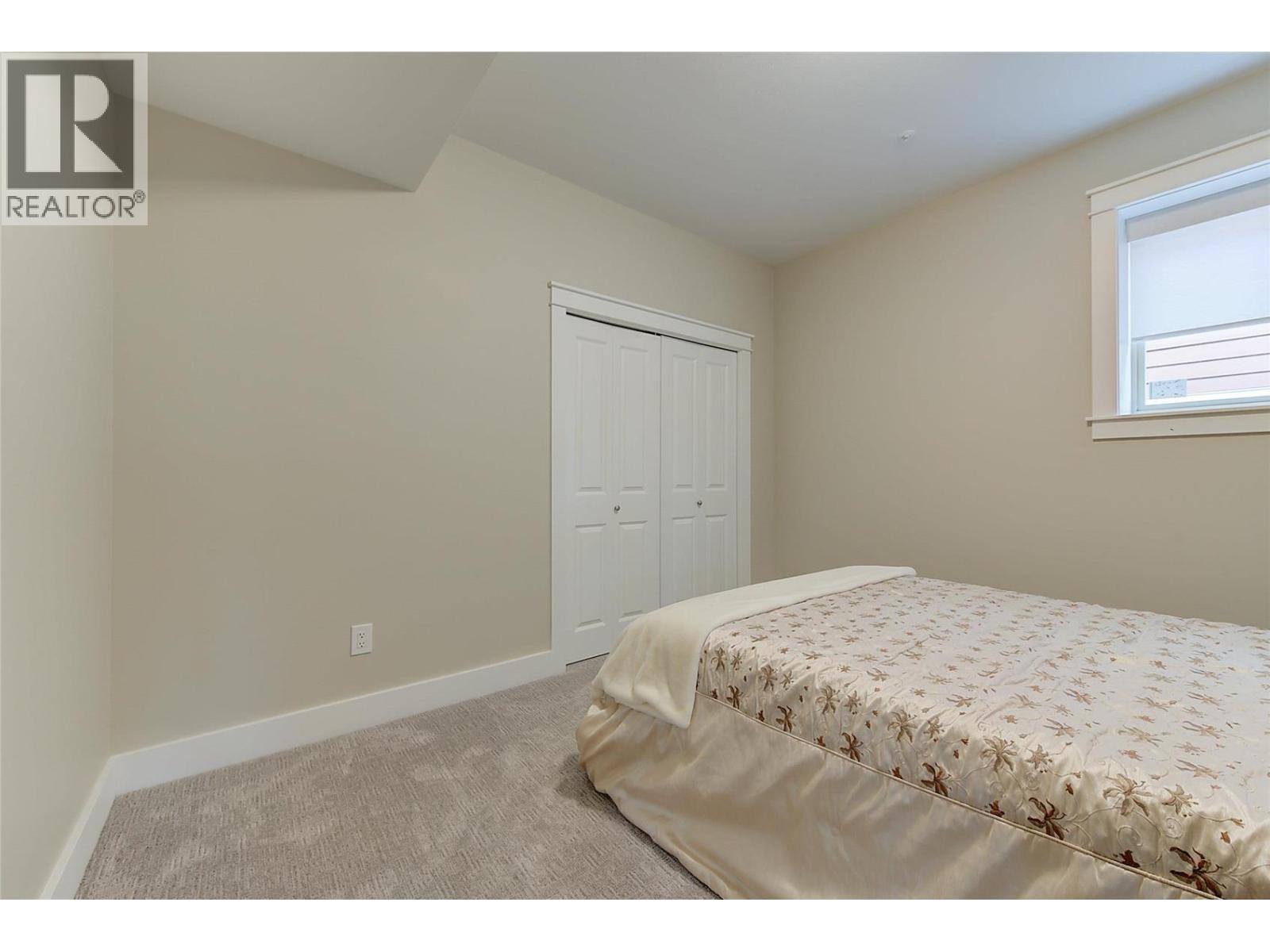 210 Dormie Place, Vernon, BC - Indoor Photo Showing Bedroom