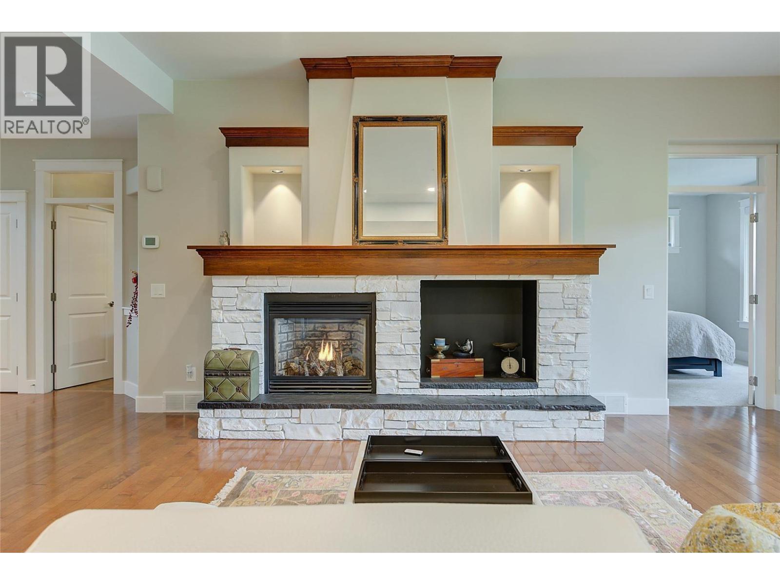210 Dormie Place, Vernon, BC - Indoor Photo Showing Living Room With Fireplace